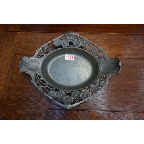 1194 - A mixed group of metalware, to include: a Orivit Art Nouveau pewter dish, 29.5cm wide.... 