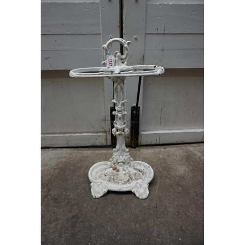 1197 - An old white painted cast iron stick stand. 