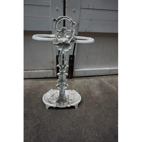 1197 - An old white painted cast iron stick stand. 