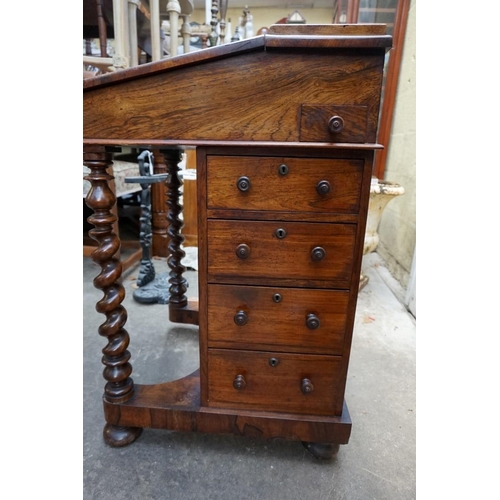 1203 - A Victorian rosewood Davenport, 52.5cm wide. 