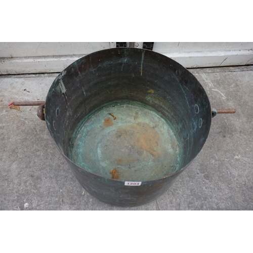 1204 - A large copper cauldron, with swing handle, 39cm diameter.