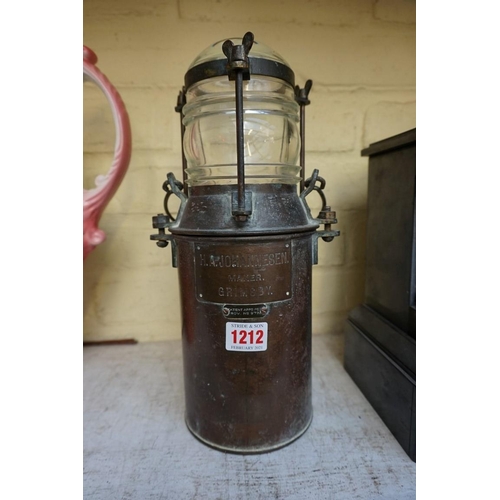 1212 - An unusual patinated brass ship's lantern, bearing plaque inscribed 'H A Johannesen Maker, Grimsby',... 