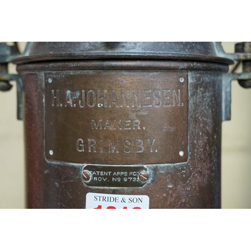 1212 - An unusual patinated brass ship's lantern, bearing plaque inscribed 'H A Johannesen Maker, Grimsby',... 