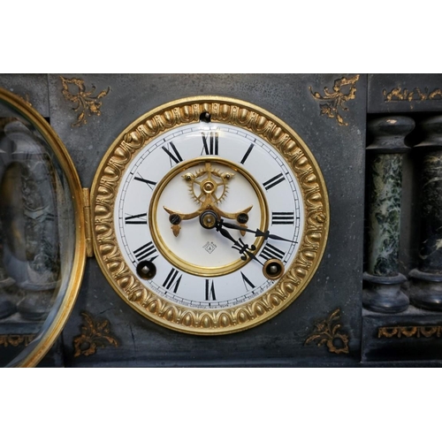 1213 - An Ansonia slate and marble architectural mantel clock, 32cm high.