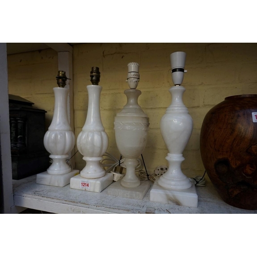 1214 - Four alabaster table lamps, height of largest excluding fitting 31cm. 