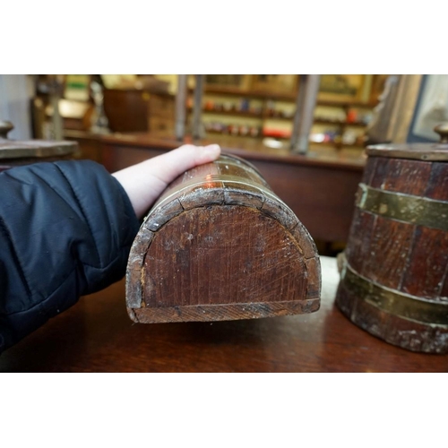 1235 - Four old brass bound coopered oak vessels, largest 25cm high; together with an oak cutlery tray, 34.... 