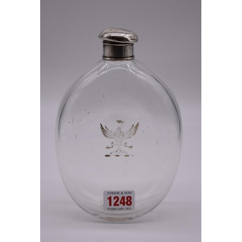 1248 - An unusually large 19th century clear glass flask, engraved with a crest, with electroplated li... 