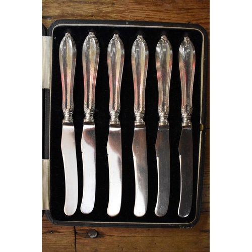 1262 - Two cased sets of six silver handled tea knives; together with a small quantity of silver plate.... 