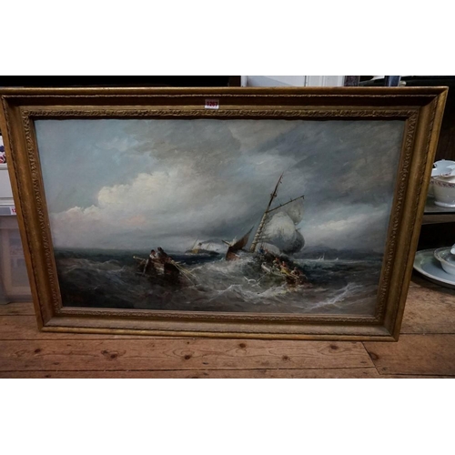 1267 - W R Webb, coastal scene with paddle steamer, signed, oil on canvas, 50 x 86cm.