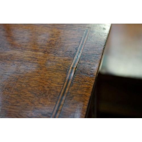 1272 - An antique mahogany and line inlaid kneehole side table, 90.5cm wide.