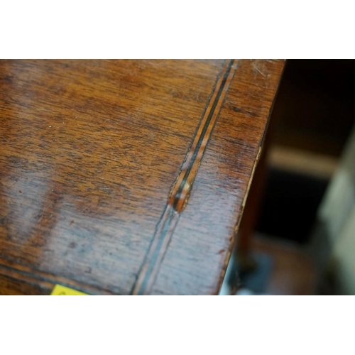 1272 - An antique mahogany and line inlaid kneehole side table, 90.5cm wide.