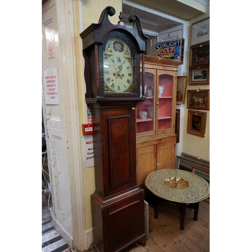 1285 - A George III oak and inlaid eight day longcase clock, the 12in arched painted dial indistinctly insc... 