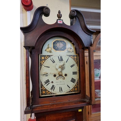 1285 - A George III oak and inlaid eight day longcase clock, the 12in arched painted dial indistinctly insc... 