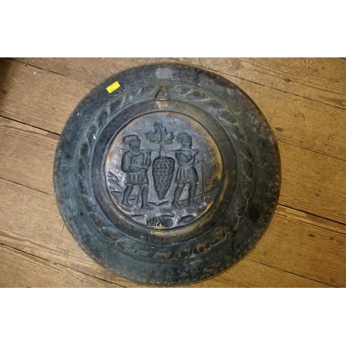 1291 - A German patinated brass alms dish, 18/19th century, 46.5cm diameter.