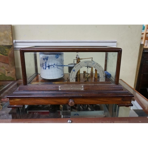 1305 - A Negretti & Zambra mahogany combined barograph and barometer, with brass plaque inscribed 'To N... 