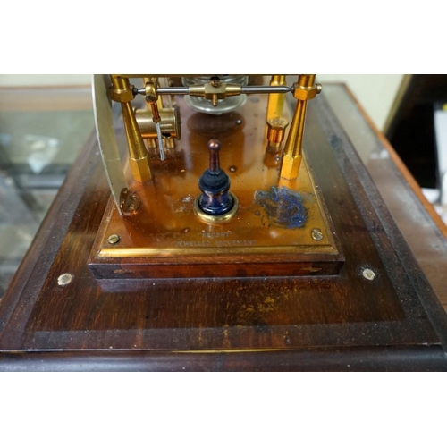 1305 - A Negretti & Zambra mahogany combined barograph and barometer, with brass plaque inscribed 'To N... 