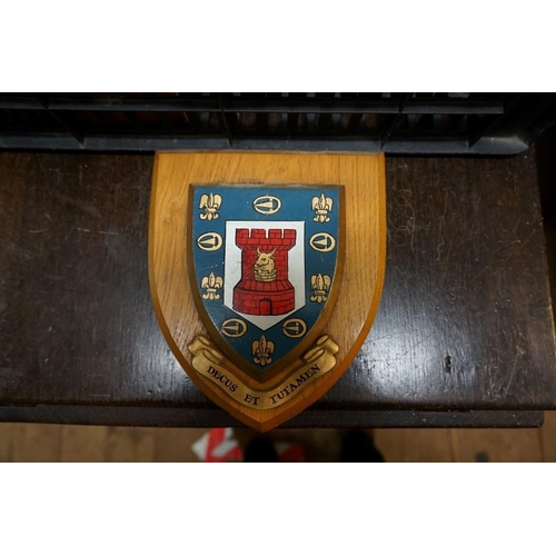 1307 - Four regimental shields; together with five army publications.