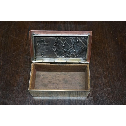 1314 - A WMF box, 12.5cm wide; together with three other small copper or brass boxes. (4)