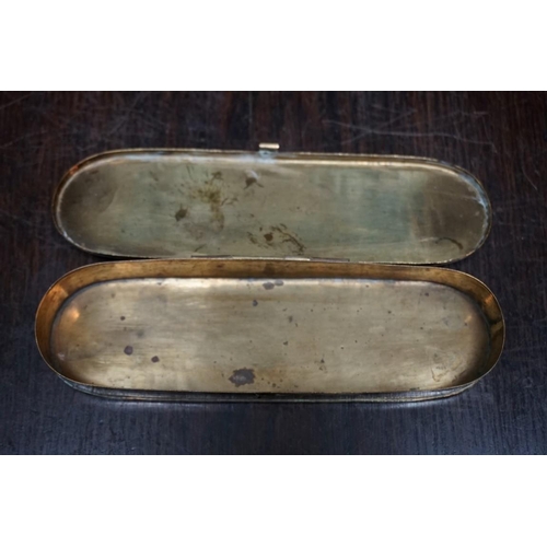 1314 - A WMF box, 12.5cm wide; together with three other small copper or brass boxes. (4)