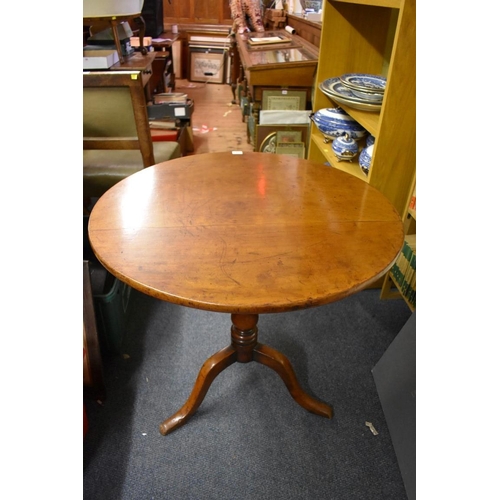 1457 - A 19th century mahogany circular tilt-top tripod table, 74.5cm wide.