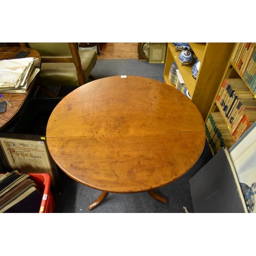 1457 - A 19th century mahogany circular tilt-top tripod table, 74.5cm wide.