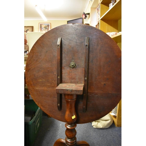 1457 - A 19th century mahogany circular tilt-top tripod table, 74.5cm wide.