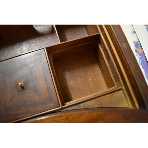 1458 - A good George III figured mahogany serpentine fronted chest of drawers, the frieze drawer with a bru... 