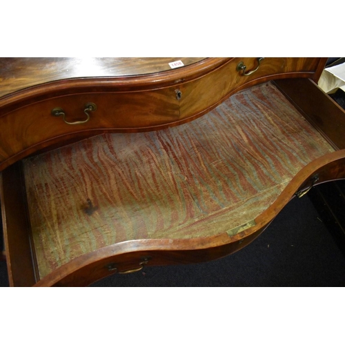 1458 - A good George III figured mahogany serpentine fronted chest of drawers, the frieze drawer with a bru... 