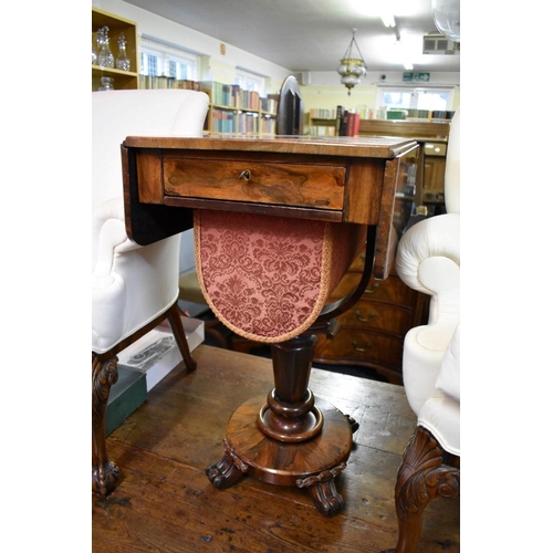 1461 - An early Victorian rosewood pedestal work table, 73.5cm wide when open.