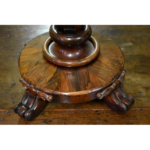 1461 - An early Victorian rosewood pedestal work table, 73.5cm wide when open.