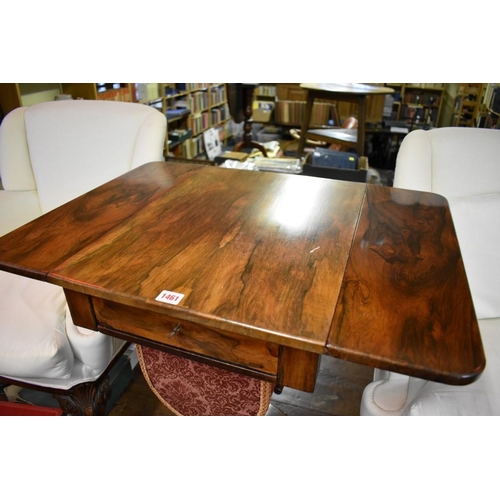 1461 - An early Victorian rosewood pedestal work table, 73.5cm wide when open.