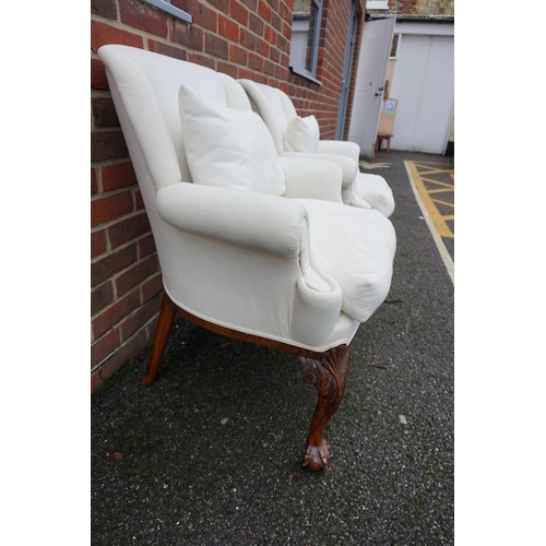 1462 - A pair of 1930s carved walnut armchairs, in the 18th century style, on cabriole legs with ball and c... 