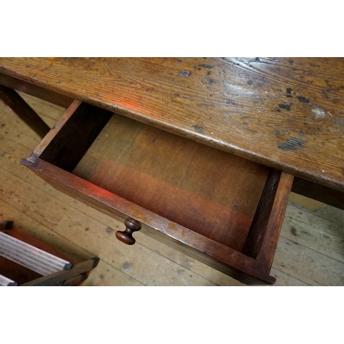 1463 - A 19th century French chestnut and oak farmhouse table, with a lateral drawer and another drawer to ... 