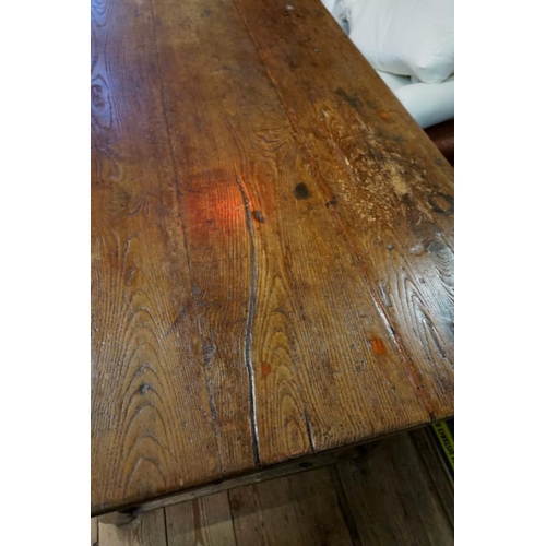 1463 - A 19th century French chestnut and oak farmhouse table, with a lateral drawer and another drawer to ... 