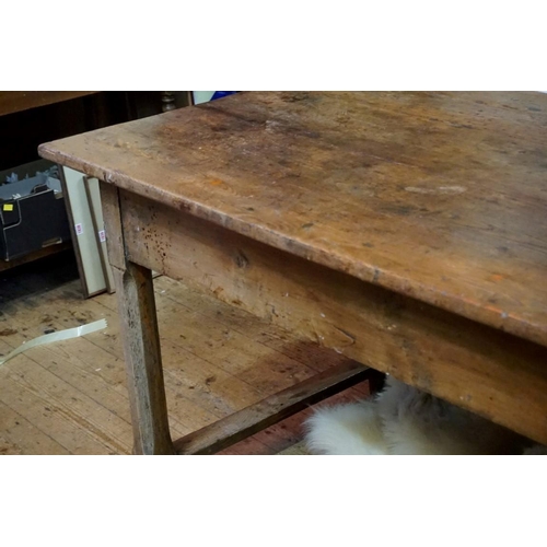 1463 - A 19th century French chestnut and oak farmhouse table, with a lateral drawer and another drawer to ... 