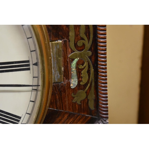 1472 - A Regency rosewood and brass inlaid octagonal wall clock, with 10in painted circular dial and single... 