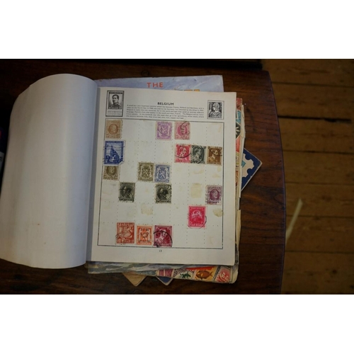 1539 - Six various stamp albums; together with another album of cigarette cards. ... 