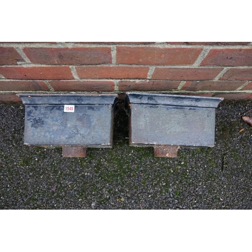 1545 - A pair of cast iron hoppers, 31cm wide.