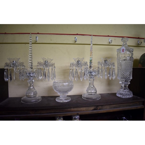 1547 - Four Waterford cut glass 'Goodwood' trophies, comprising: a pair of twin branch candelabra, 46cm hig... 