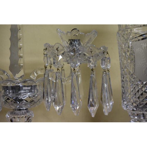 1547 - Four Waterford cut glass 'Goodwood' trophies, comprising: a pair of twin branch candelabra, 46cm hig... 