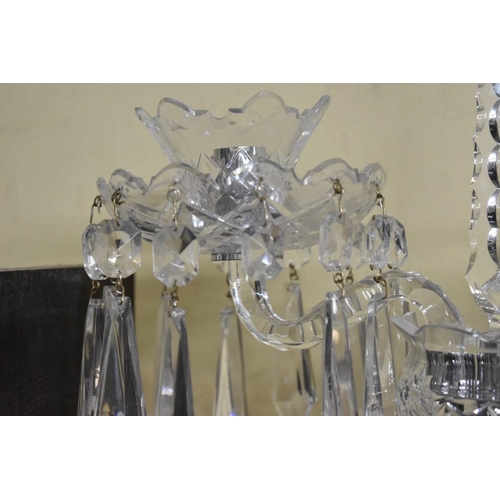 1547 - Four Waterford cut glass 'Goodwood' trophies, comprising: a pair of twin branch candelabra, 46cm hig... 