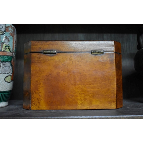 1550 - A George III satinwood and inlaid tea caddy, 19cm wide.