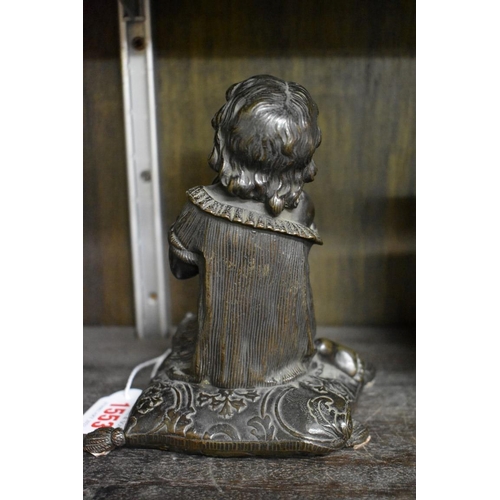 1553 - A Victorian bronze figure of a praying child, kneeling on a cushion, 15cm high.... 