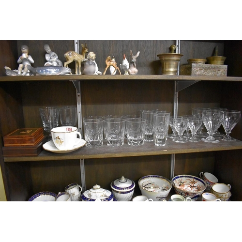 1558 - A small group of clear glass drinking glasses; together with a Royal Crown Derby cup and saucer; and... 