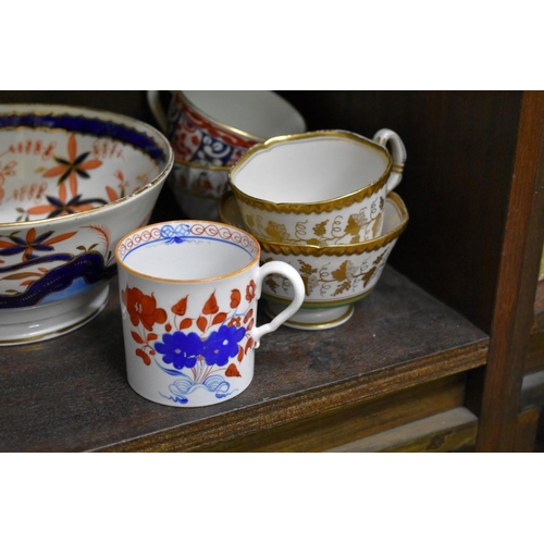 1559 - A collection of late 18th/early 19th century porcelain teawares, to include: Worcester and Barr, Fli... 