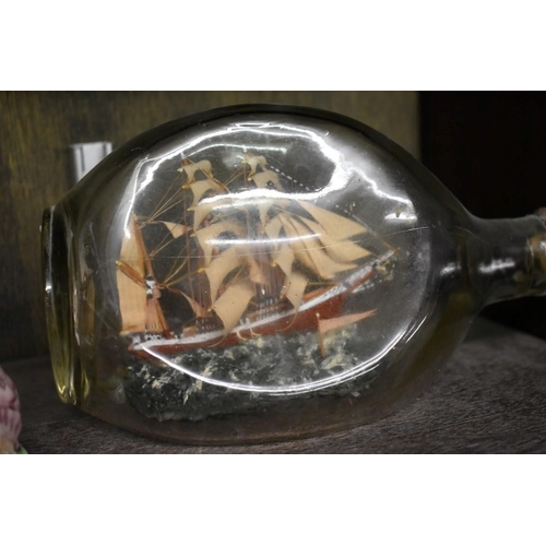 1562 - A novelty ship in Haig's Dimple whisky bottle, length excluding cork 20cm.