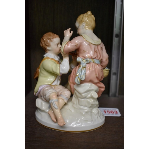 1563 - A KPM porcelain figure group of two children, 16.5cm high.