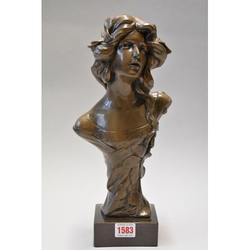 1583 - A bronzed resin Art Nouveau bust, 35cm high. 