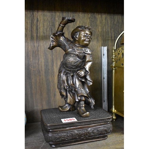 1585 - A Japanese bronze dancing figure, Meiji, in Chinese emperor's robes, 28cm high.... 