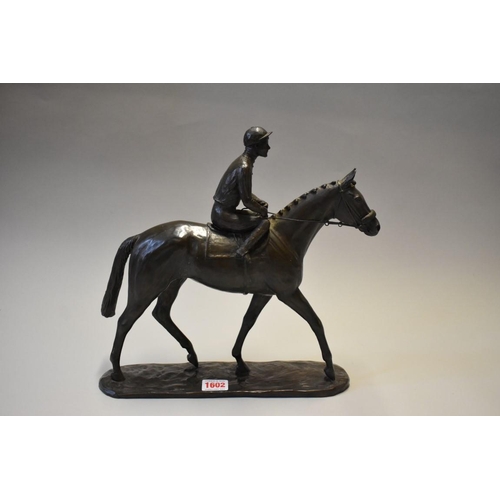 1602 - A Minerva Fine Arts bronzed resin horse and jockey figure group, inscribed 'Ista', dated 1978 and nu... 